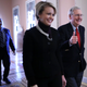 Senate Majority Leader Mitch McConnell (right) gives a thumbs-up as he and his director of operations, Stephanie Muchow, head for the Senate floor at the U.S. Capitol in Washington, D.C., on Dec. 1, 2017. (Chip Somodevilla/Getty Images)
